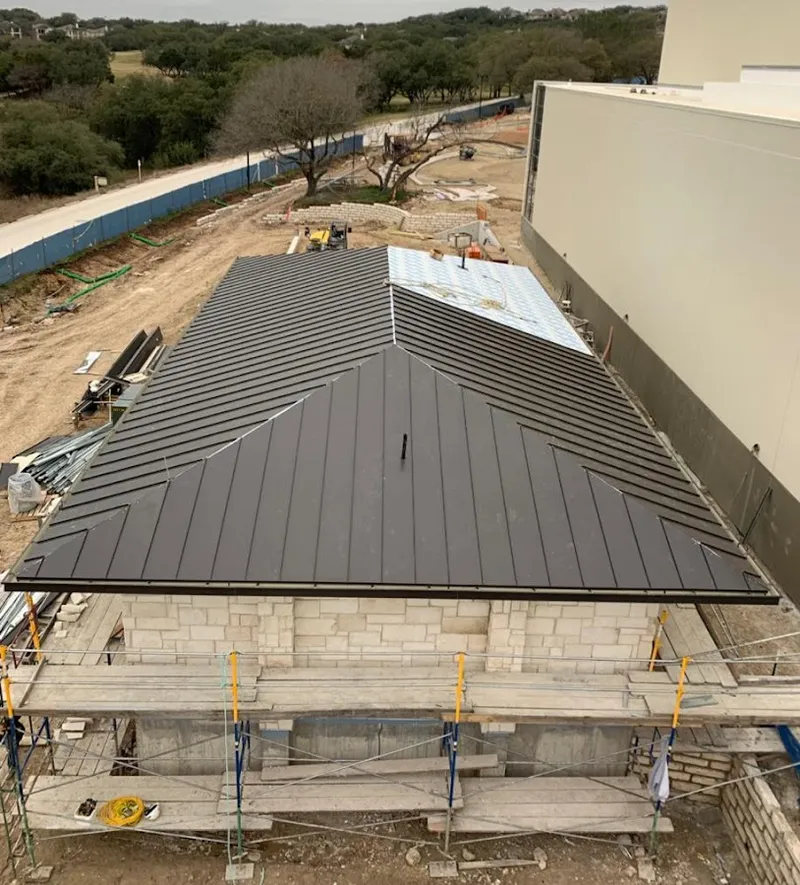 Metal roof new construction with scaffolding in Ham Lake