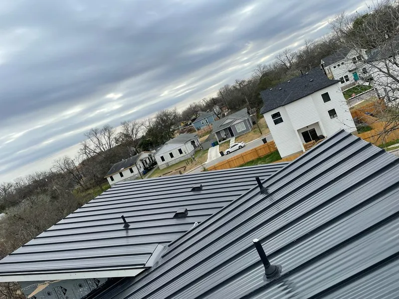Standing seam metal roof panels with vents for Skylight Repair in Ham Lake